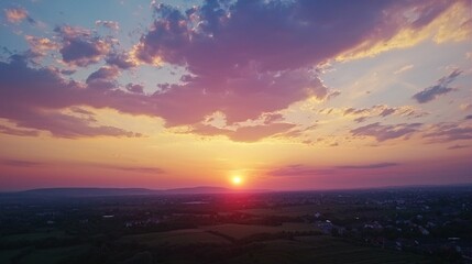 Fototapeta premium Sunset with colorful clouds glowing in the sky