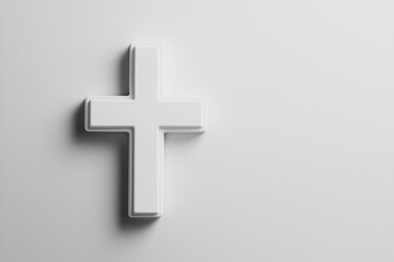 Fototapeta premium A minimalist white cross displayed against a plain background.