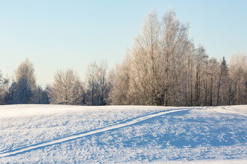 sunny, snowy winter day in the countryside