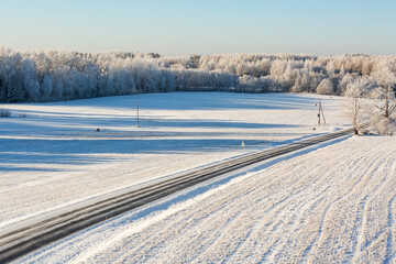 sunny, snowy winter day in the countryside
