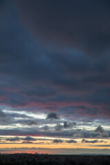 Beautiful skyscape with clouds at sunrise