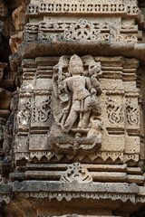 Carved idols on the outer wall of Shri Kapileshwar Mahadev Mandir, Velhale, near Bhusawal, Maharashtra, India