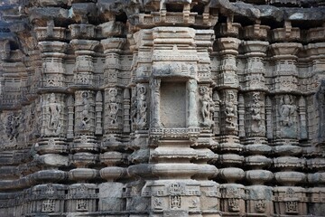 Carved idols on the outer wall of Shri Kapileshwar Mahadev Mandir, Velhale, near Bhusawal, Maharashtra, India