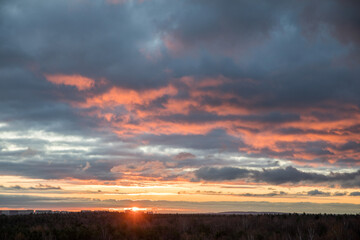 Beautiful skyscape with clouds at sunrise