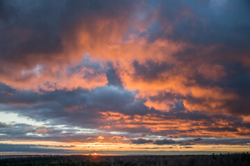 Beautiful skyscape with clouds at sunrise