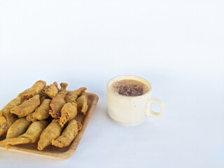 Molen banana cake and a cup of coffee water