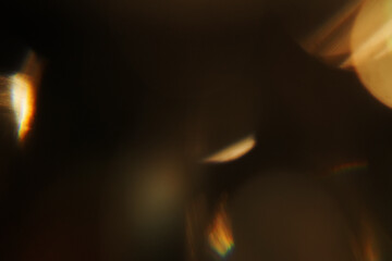 Prismatic Luxury Gold Overlays – High-resolution abstract light and golden bokeh textures....