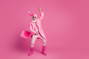 Photo of optimistic cheerful funky carefree retired man jumping rodeo cowboy ranch isolated on pink color background