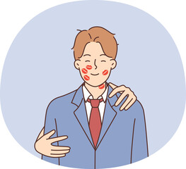 Romantic man with traces of lipstick on face and hands of woman hugging boyfriend from behind. Romantic guy in business suit smiles rejoicing at female attention from wife or mistress