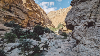 Wadi Shab, very popular wadi in the Al Sharqiyah Region in Oman with water fall in the cave, swimming in natural pools, leisurely walk leisurelywalwalk to the entrance of the wadi.