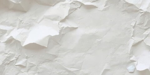 Obraz premium Crumpled white paper with visible creases and wrinkles, blank, discarded
