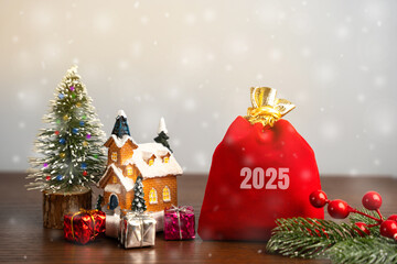 Bag 2025, Christmas tree and house with gifts. New Year or Xmas winter holiday. The concept of the...