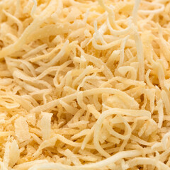 Cocos nucifera - Pile of fresh shredded coconut.