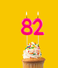 Pink candle and cupcake birthday card - Number 82