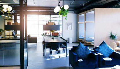Empty office, workplace and design of coworking space with table, chair and architecture at startup company. Creative furniture, room and interior with modern setup, decoration and business building