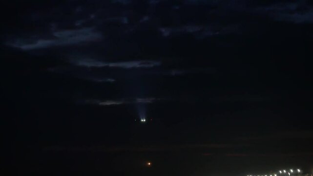 Aircraft taking off at night. Alicante-Elche airport, Spain.
