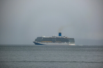 Modern family cruiseship cruise ship liner Luminosa sail away departure from Seattle, Washington...