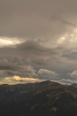 Fototapeta premium Rocky Terrain in the Tatra Mountains with a Cloudy Sky