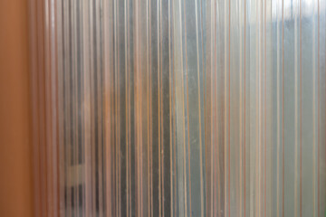 Fototapeta premium yellow PVC Curtain of food Industrial warehouse. plastic strip curtain at entrance door.