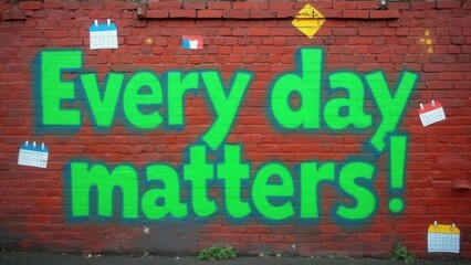 A vibrant mural painted on a red brick wall conveys a powerful message highlighting the significance of each day. Surrounding elements include calendar illustrations, adding to the motivational atmosp