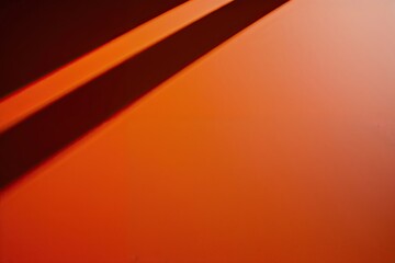 Obraz premium Dynamic Orange Gradient Surface Transitioning from Bright to Dark