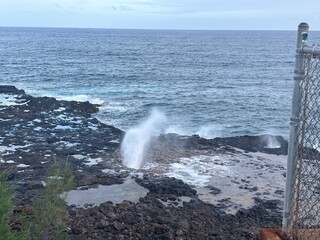 waves breaking on rocks