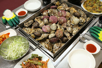 Korean Seafood Food. Steamed oysters and clams