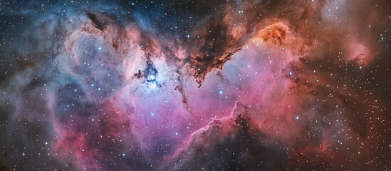 Obraz premium Stunning cosmic nebula with vibrant colors and star formations.