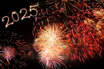 Sparkler 2025. Firework illumination on dark sky background, happy new year 2025 concept. Sparkler...