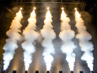 A stage with multiple smoke jets creating a dramatic lighting effect.