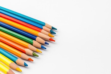 Colorful school supplies on a white background