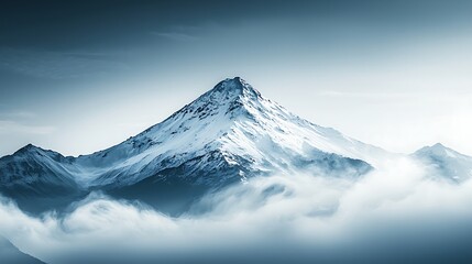 Fototapeta premium Breathtaking Snow-Capped Mountain Peaks Emerging from a Sea of Fog Under a Tranquil Sky, Capturing Nature's Majesty and Serenity in a Stunning Landscape