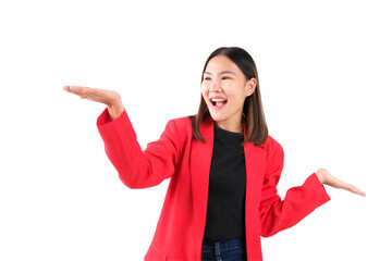 Cheerful woman in a red blazer showing excitement with arms outstretched against a white background.