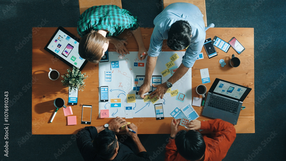 Poster top view of developer team sharing idea of ux ui design by using mind map. top down view of group of
