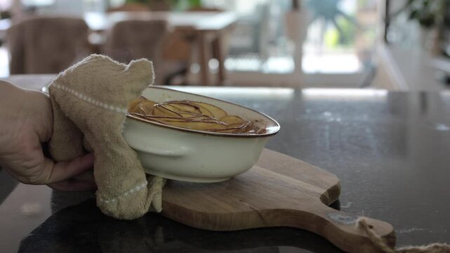 Beautifully crafted apple tart with a golden crust and delicate apple slices, perfect for cozy autumn or winter-themed advertising, social media content, or food promotions.