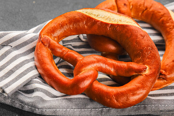 Bretzel fresh baked goods brezel tasty food dish delicious gourmet food background on the table...
