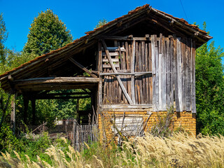 Traditional old abandoned barn in the village of Debnevo, Troyan Municipality, Lovech Province, Northern Bulgaria