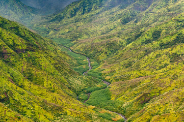 The Napali Coast of Kauai, Hawaii as viewed from a helicopter on the Pacific Ocean.