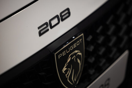 Modern Peugeot 208 Badge Close-up - Detailed Peugeot 208 Emblem for Automotive Editorial Content