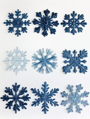 Fototapeta premium Various blue snowflake patterns on a white backdrop