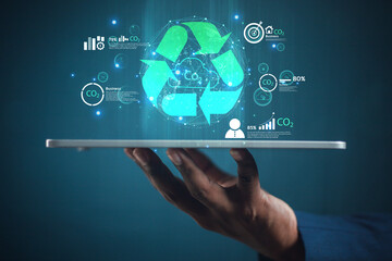Women engineers using laptops for work technology and business, Net zero and carbon-neutral concepts. Green businesses using renewable energy to love the world of the future	
