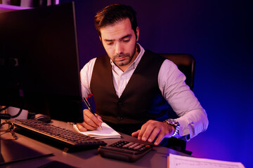 Smart businessman analyzing paperwork report folder, calculation of profit or loss for sales...