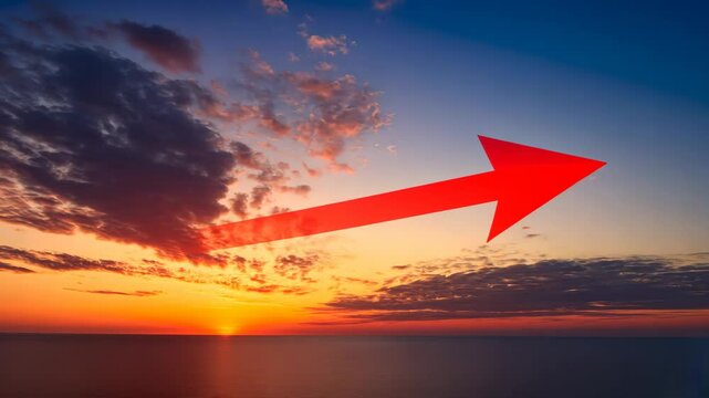 Sunset over ocean with dramatic clouds and red arrow, nature and direction concept