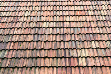 Fototapeta premium A close-up of an old red tiled roof.