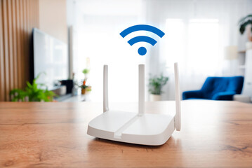 Modern wi-fi router on light table in room