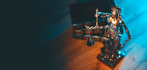Lady Justice figurine on table. Law and justice