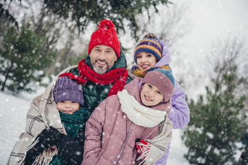 Photo of full friendly lovely family embrace toothy smile enjoy free time walking woods outside