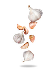 Garlic cloves in the air close up isolated on a white background