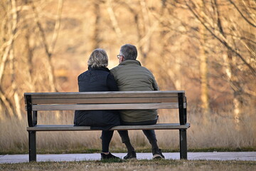 couple sitting on bench