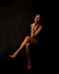 Fototapeta premium Studio portrait of a young fashion model